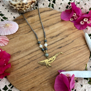 brass humpback whale necklaces adorned with crystal beads