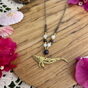 brass humpback whale necklaces adorned with crystal beads